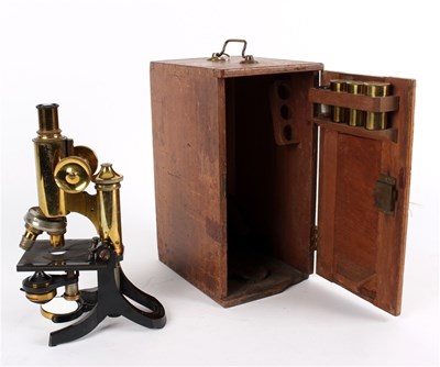 Lot 320 - A gilt brass microscope by J Swift & Son...