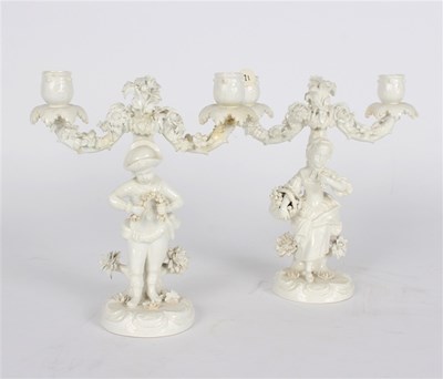 Lot 346 - A pair of John Bevington two-branch candelabra,...
