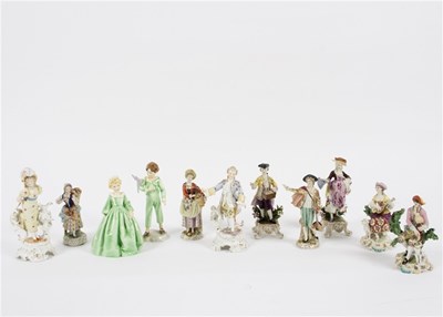 Lot 384 - A pair of Continental figures of musicians,...
