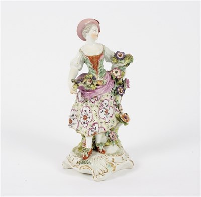 Lot 388 - A Derby figure, Woman with basket of flowers,...