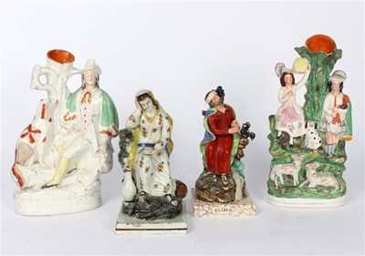 Lot 393 - Two 19th Century Staffordshire figures, Elijah...