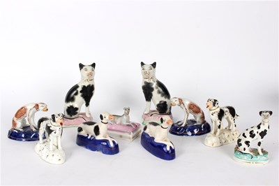 Lot 406 - A pair of English porcelaneous models of...