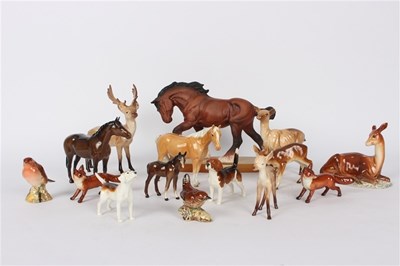 Lot 411 - A collection of Beswick horses, hounds, foxes...