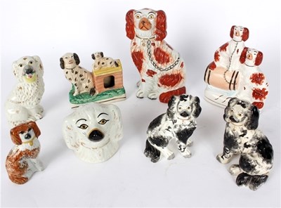 Lot 412 - A group of Staffordshire pottery models of...