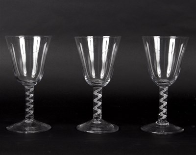 Lot 415 - Three air-twist goblets, possibly circa 1750,...