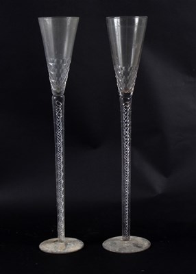 Lot 426 - Two oversized air twist stemmed glasses, 19th...