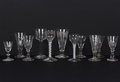 Lot 431 - An 18th Century wine glass, the bowl engraved...