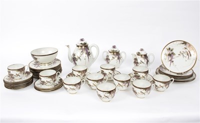 Lot 469 - A Japanese eggshell porcelain tea service...