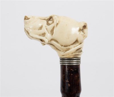 Lot 481 - A walking stick, the carved ivory handle in...