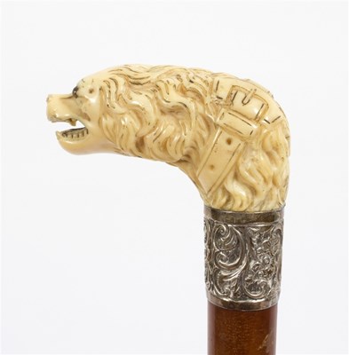 Lot 484 - A walking stick, the carved ivory spaniel head...