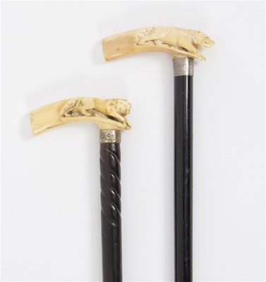 Lot 486 - An ebonised walking stick, the carved ivory...