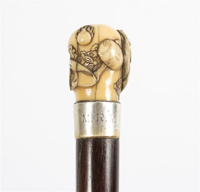 Lot 495 - A Japanese walking stick, the ivory handle...