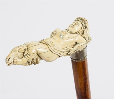 Lot 500 - A walking stick, the carved ivory handle in...