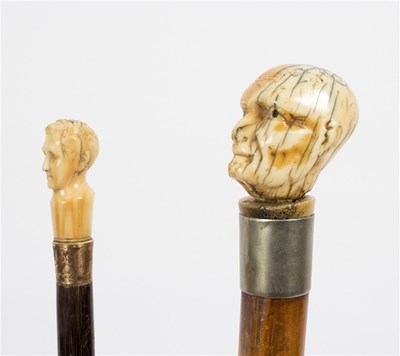 Lot 501 - A walking stick with carved ivory head handle...