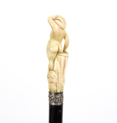 Lot 505 - An ebonised walking stick, the 18th Century...