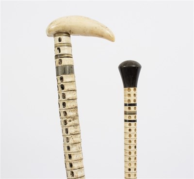 Lot 511 - A shark vertebra walking stick with an ivory...
