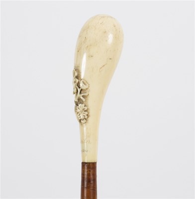 Lot 514 - A bamboo walking stick, the carved ivory...