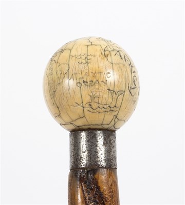 Lot 516 - A spirally ribbed walking stick, the ivory...