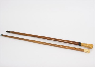 Lot 521 - A walking stick, the bone handle with steel...
