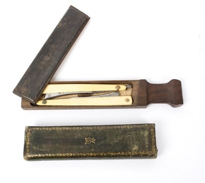 Lot 544 - A French razor box, by Gillett, containing two...