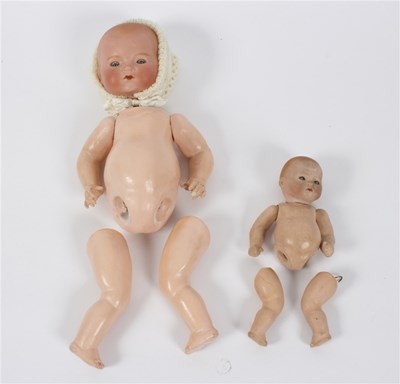 Lot 559 - Two Armand Marseille bisque head dolls with...