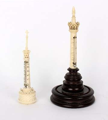 Lot 834 - An ivory cased thermometer in the form of a...