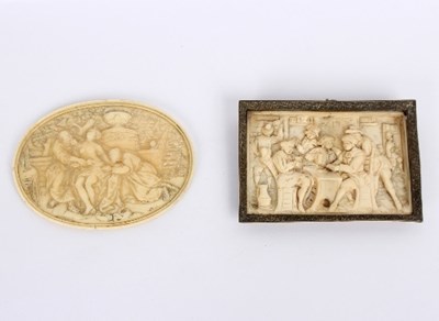 Lot 835 - A 18th Century French carved ivory oval plaque...