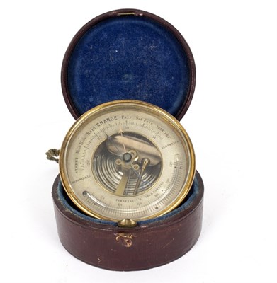 Lot 847 - A holosteric barometer in a brass case, 7cm...