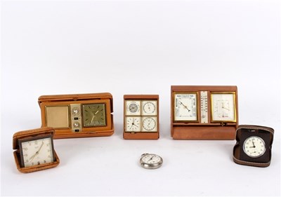 Lot 854 - A travel clock, barometer and thermometer by...