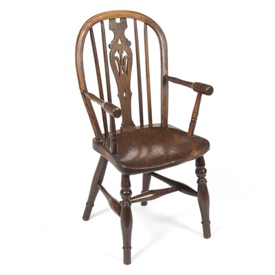 Lot 887 - A child's stick back chair with elm...