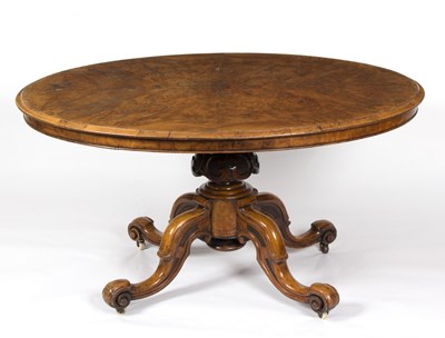 Lot 893 - A Victorian oval breakfast table on a carved...