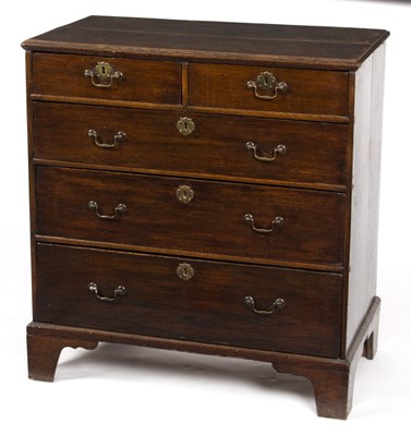 Lot 895 - A late 18th Century oak chest of three long...