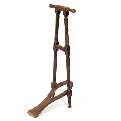 Lot 897 - A folding boot pull/Provenance: Beverston Castle
