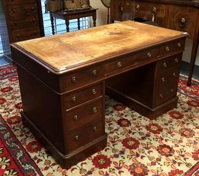 Lot 898 - An early 20th century mahogany pedestal desk,...