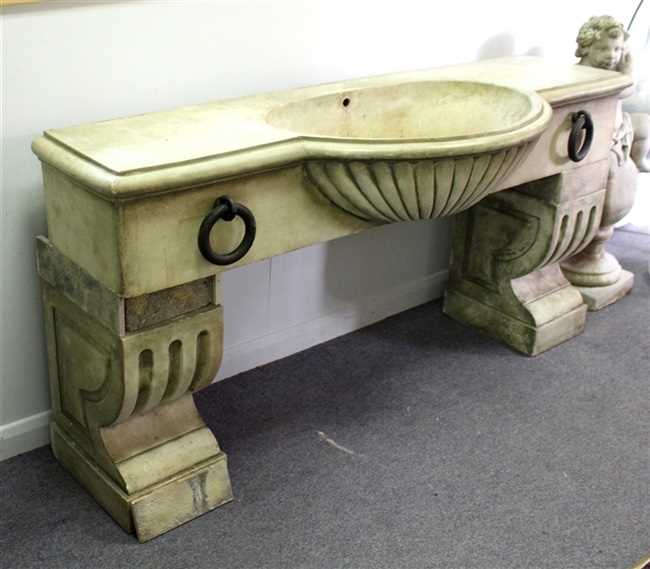 Lot 901 - A reconstituted stone horse trough form sink,...