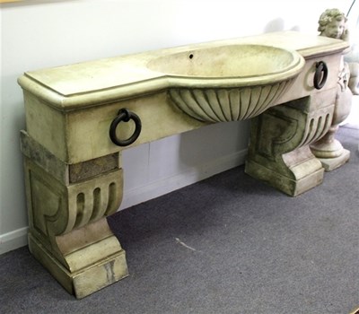Lot 901 - A reconstituted stone horse trough form sink,...