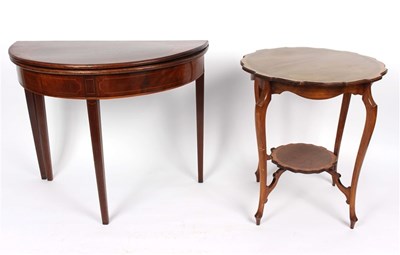 Lot 904 - A George III mahogany half-round tea table...