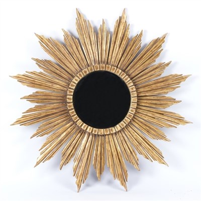 Lot 910 - A modern carved and gilded starburst mirror...