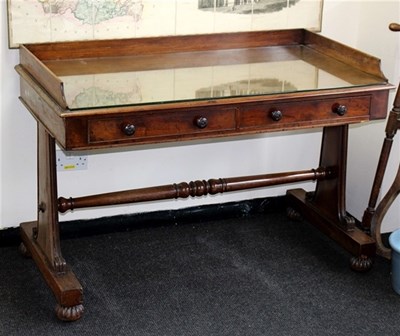 Lot 913 - A Regency mahogany dressing table on tapered...