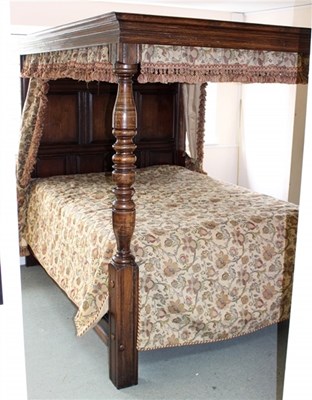 Lot 924 - An oak four poster bed of Elizabethan design...