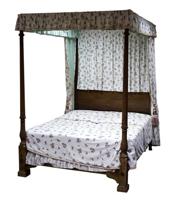 Lot 925 - A Heals mahogany four poster bed with reeded...