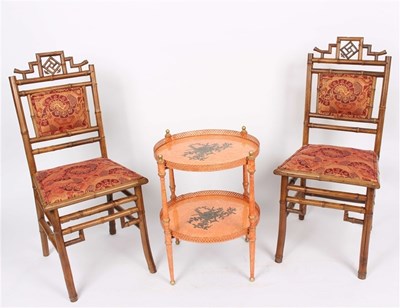 Lot 940 - A painted and decorated two-tier table, each...