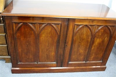 Lot 941 - A mahogany cupboard enclosed by a pair of twin...