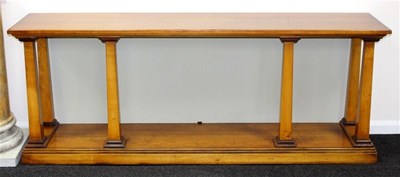 Lot 945 - A modern console table with four square taper...