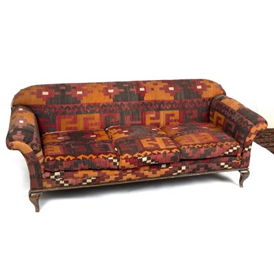 Lot 950 - A 19th Century sofa covered in kelim rug...