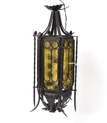 Lot 975 - An Italian wrought iron hall lantern, of...