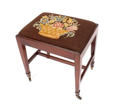 Lot 981 - A mahogany stool fitted a loose trap...
