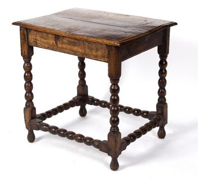 Lot 1001 - An 18th Century oak side table on ball turned...