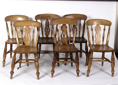 Lot 1005 - A set of six beech and elm bar-back kitchen...