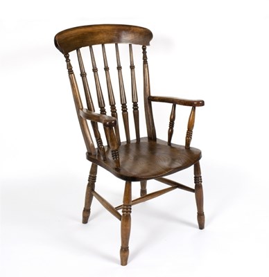 Lot 1006 - A Windsor stick-back open armchair